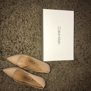 Calvin Klein Kamara Napa’s Nude Leather pumps.